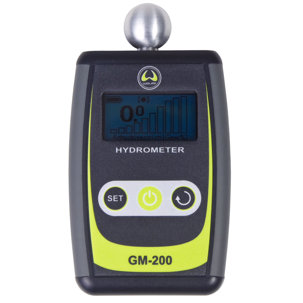 WOLFF_Dummy_71054_GM 200_2025-08 Handheld digital hydrometer/moisture meter GM-200 with a metallic spherical probe mounted on top. The device has a black and dark gray plastic housing with neon yellow accents, a small monochrome LCD displaying '0°' and a bar graph, the 'WOLFF' logo above the display, the labels 'HYDROMETER' and 'GM-200', and three round front buttons labeled 'SET', a power symbol and a rotate/return symbol.