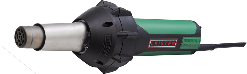 Green and black Leister heat gun with metal nozzle and power cord, shown horizontally; handheld hot-air tool for plastic welding, paint stripping and surface heating.