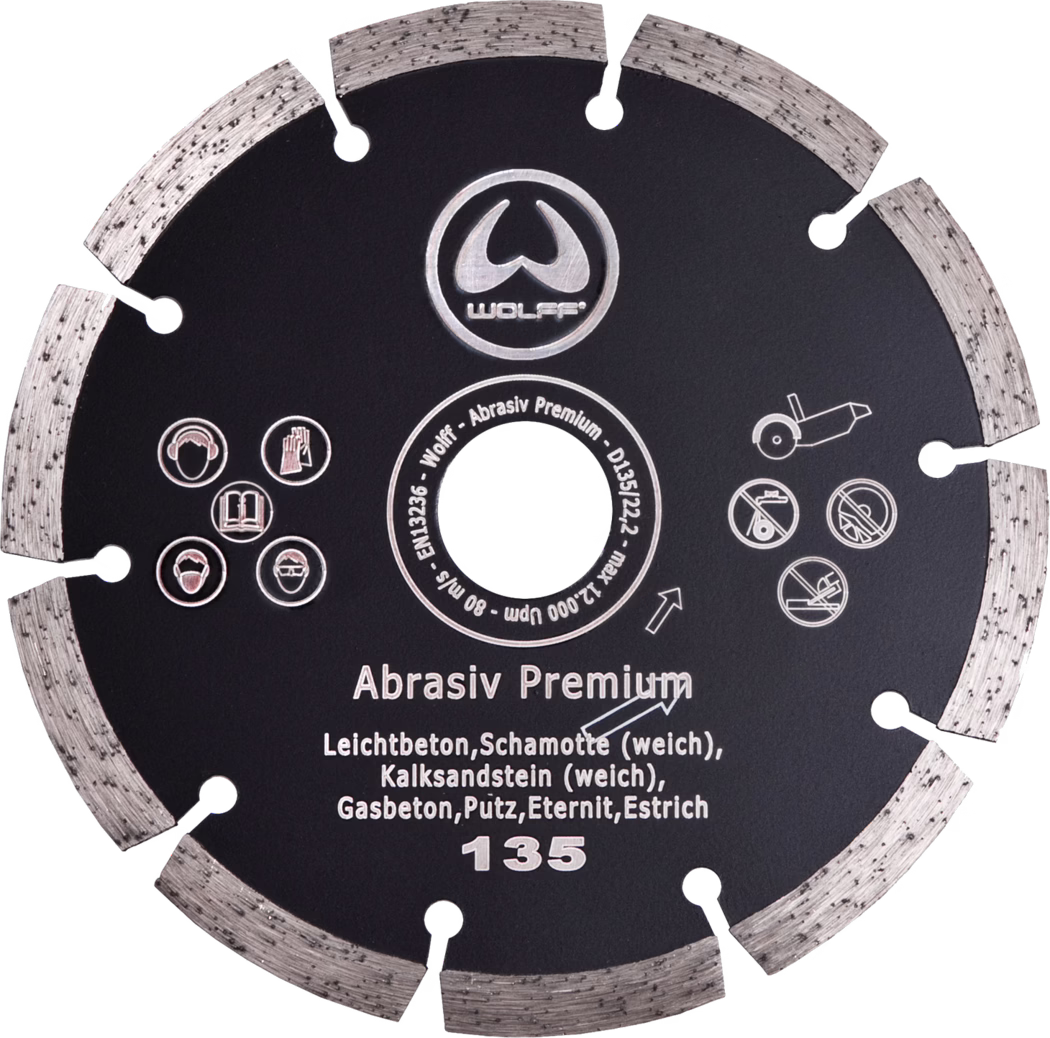 Black segmented diamond cutting disc (135 mm) labeled 'Abrasiv Premium', suitable for lightweight concrete, chamotte (soft), soft calcareous sandstone, aerated concrete, plaster, Eternit and screed; central mounting hole and safety pictograms visible.