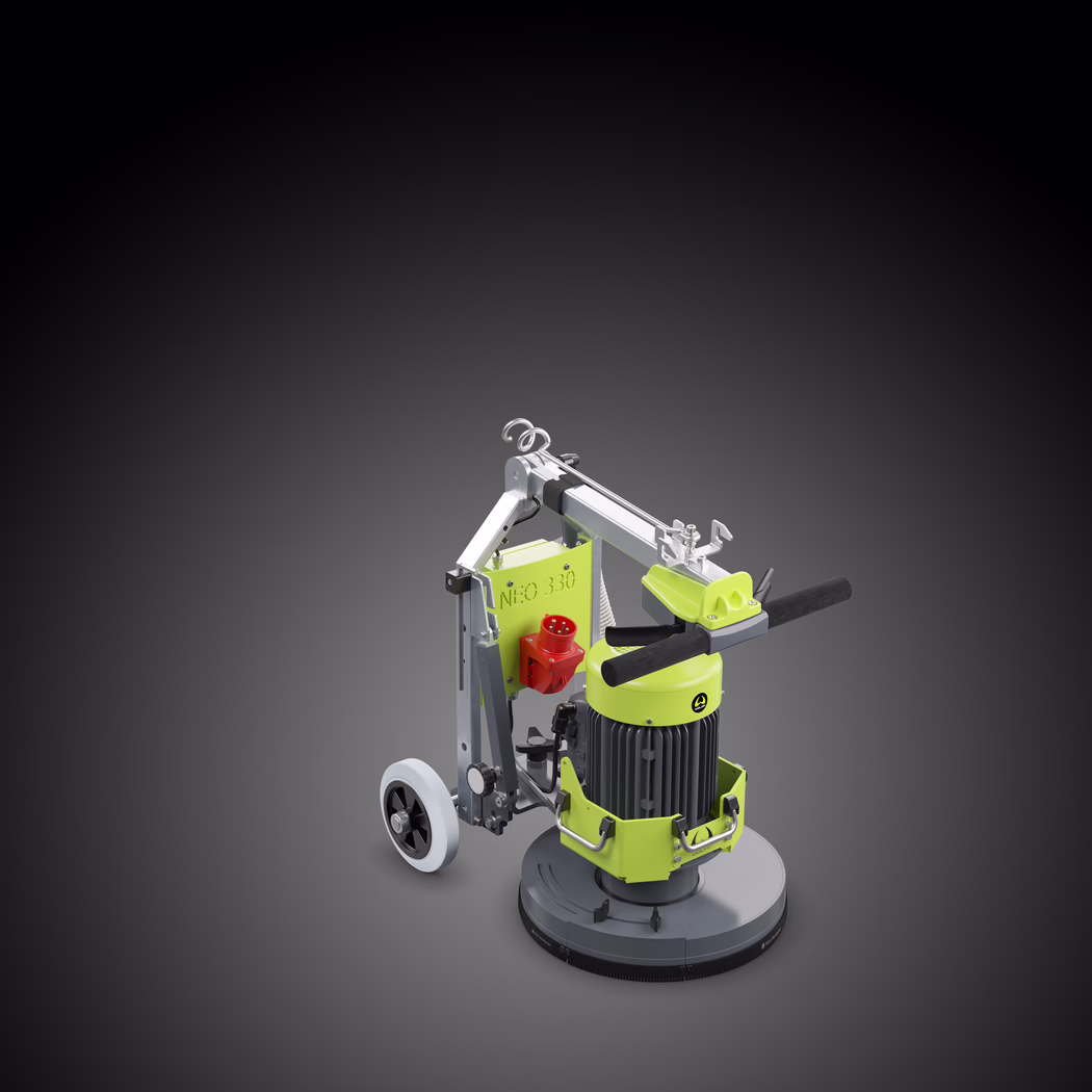 WOLFF_Application Image_NEO330_183050_01_2026-03 A compact industrial floor polishing and grinding machine in lime-green and dark grey. It features a vertical cylindrical motor housing with cooling fins, a circular low-profile grinding/polishing base, foam-padded horizontal handles, an adjustable metal support arm with transport wheels and quick-release clamps, and a red electrical connector mounted on the side. The unit is shown on a neutral grey background with soft spotlighting, highlighting its metal brackets, sturdy construction and ergonomic controls for concrete and stone surface preparation.